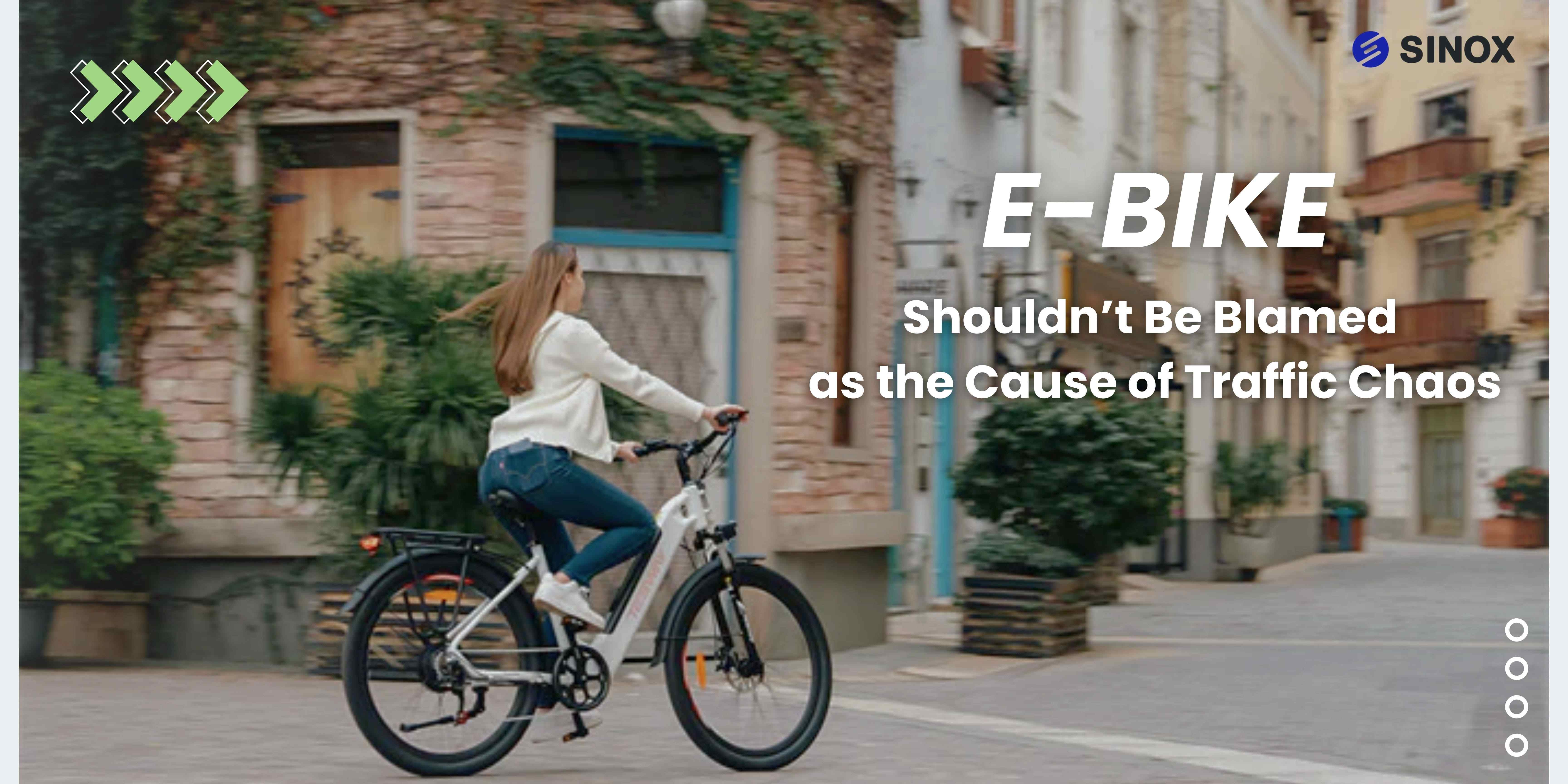 A woman riding an electric bike on an urban street with greenery and vintage buildings in the background. The text emphasizes that electric bikes shouldn't be blamed for traffic chaos. Sinox electric bikes promote sustainability and urban traffic harmony.